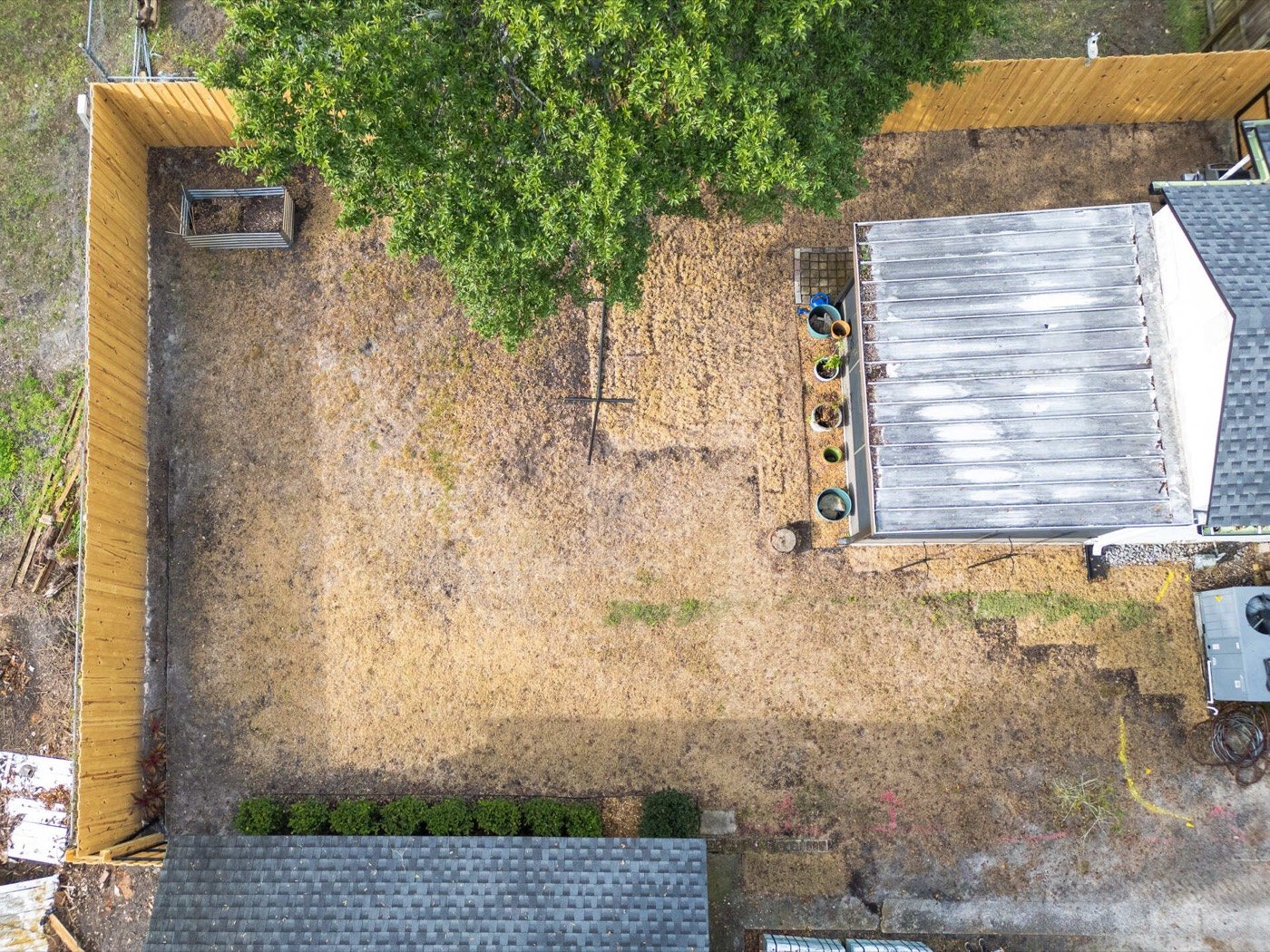 San Marco property before, drone top-down